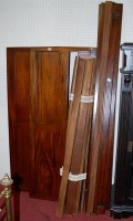 Lot 1083 - A modern hardwood double bedstead, having...