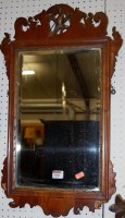 Lot 1088 - A George II style walnut framed fret carved...