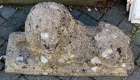 Lot 1097 - A reconstituted stone garden figure of a...