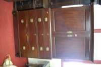Lot 1110 - A 19th century mahogany secretaire cupboard...