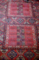 Lot 1113 - A Belgian woollen rug in the Persian style,...