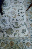 Lot 1115 - A modern machine woven rug, having all-over...