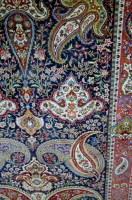 Lot 1119 - A Persian woollen rug, having central...