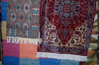 Lot 1122 - A Persian style silk rug, having central...