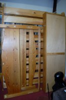 Lot 1134 - A modern turned pine double bedstead, having...