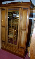 Lot 1135 - An Edwardian walnut single mirror door...