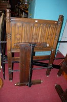 Lot 1140 - A Gothic style moulded oak single bedstead,...