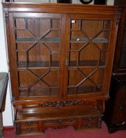 Lot 1106 - A late Victorian oak bookcase, having...