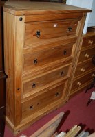 Lot 1171 - A modern Mexican pine chest of four long...