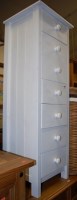 Lot 1172 - A modern pine and white painted narrow chest...