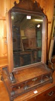 Lot 1174 - A George III mahogany swing frame toiletry...