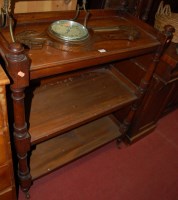 Lot 1177 - A Victorian mahogany three tier buffet, on...