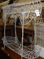 Lot 1187 - A Victorian white painted wirework two tier...
