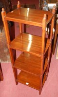 Lot 1199 - A Victorian style mahogany five tier whatnot,...