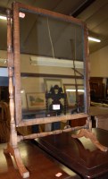 Lot 1202 - A mahogany swing frame toiletry mirror in the...