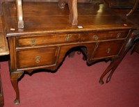 Lot 1154 - A 1920s walnut dressing table, the rectangular...