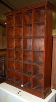 Lot 1214 - A modern hardwood flight of pigeonholes, w.69cm