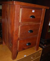 Lot 1222 - A modern hardwood chest of three short drawers,...