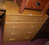 Lot 1223 - A 1960s G-Plan oak chest of four long...