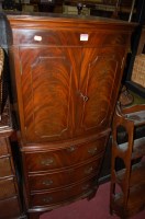 Lot 1227 - A reproduction mahogany bowfront drinks...