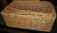 Lot 1230 - A graduated set of three wicker rectangular...