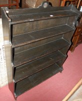 Lot 1232 - An early 20th century oak five tier waterfall...