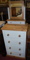 Lot 1237 - A modern pine and white painted chest of four...