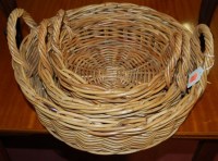Lot 1240 - A graduated set of three circular wicker baskets