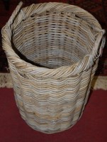 Lot 1244 - A wicker twin handled basket