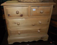 Lot 1162 - A small modern pine chest of two short over...