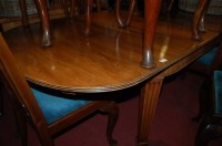 Lot 1250 - A mahogany extending dining table, the oval...