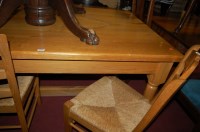 Lot 1254 - A contemporary elm refectory table, raised on...