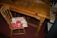 Lot 1262 - A modern pine refectory table, having planked...