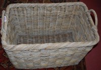 Lot 1263 - A large rectangular wicker twin handled basket