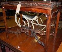 Lot 1264 - A reproduction mahogany silver table, in the...