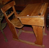 Lot 1268 - A late Victorian pitch pine childs school desk,...