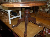 Lot 1272 - A Victorian walnut breakfast table, the...