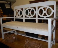 Lot 1275 - A white painted bench, having pierced open...