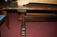 Lot 1281 - An oak refectory table, the planked top on...