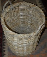 Lot 1282 - A large circular wicker twin handled basket