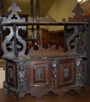 Lot 1167 - An early 20th century carved oak two-tier wall...