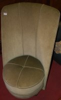 Lot 1314 - A green upholstered high backed nursing chair,...