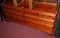 Lot 1321 - A modern Ducal stained pine chest of two banks...