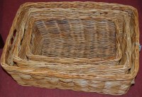 Lot 1207 - A graduated set of three wicker baskets