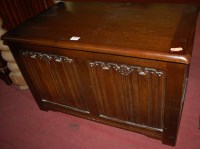 Lot 1330 - An oak blanket box having a hinged lid and...