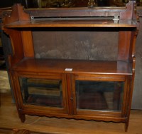 Lot 1342 - An Edwardian walnut hanging cabinet enclosed...