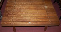 Lot 1356 - A beech rectangular low occasional table...