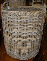 Lot 1248 - A large circular wicker twin handled basket