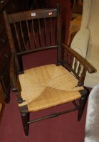 Lot 1307 - An early 20th century beech open armchair...