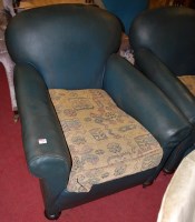 Lot 1310 - A pair of Edwardian green rexine upholstered...